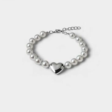 Heart of pearl on a grey studio backdrop